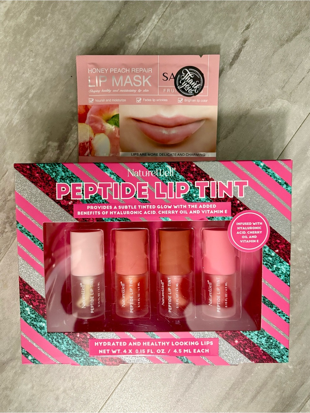 NatureWell Peptide Lip Tint gift set + Honey Peach Repair Lip Mask.